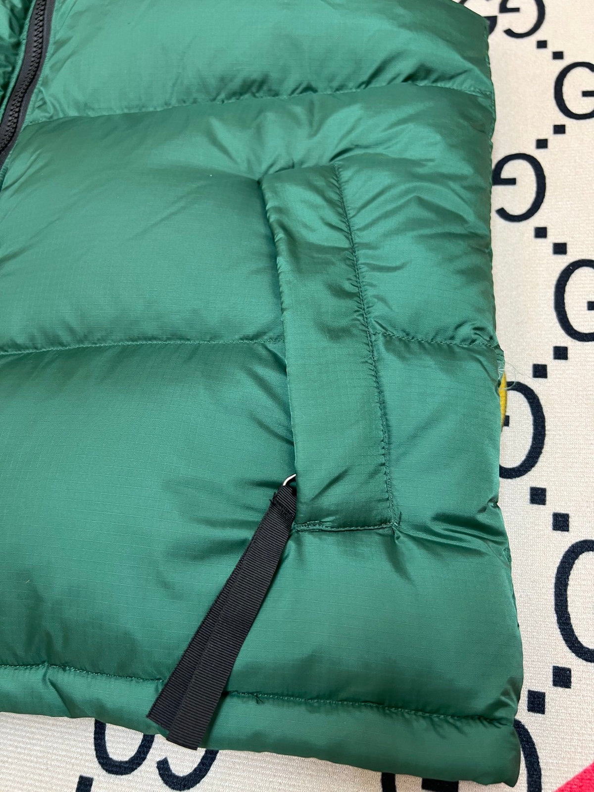 The North Face Puffer Vest in Green and Black with Stand Collar