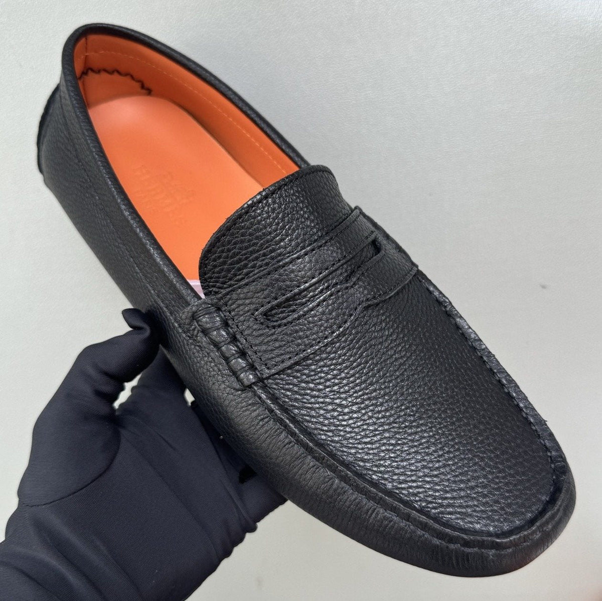 Hermès Men's Black Textured Penny Loafers